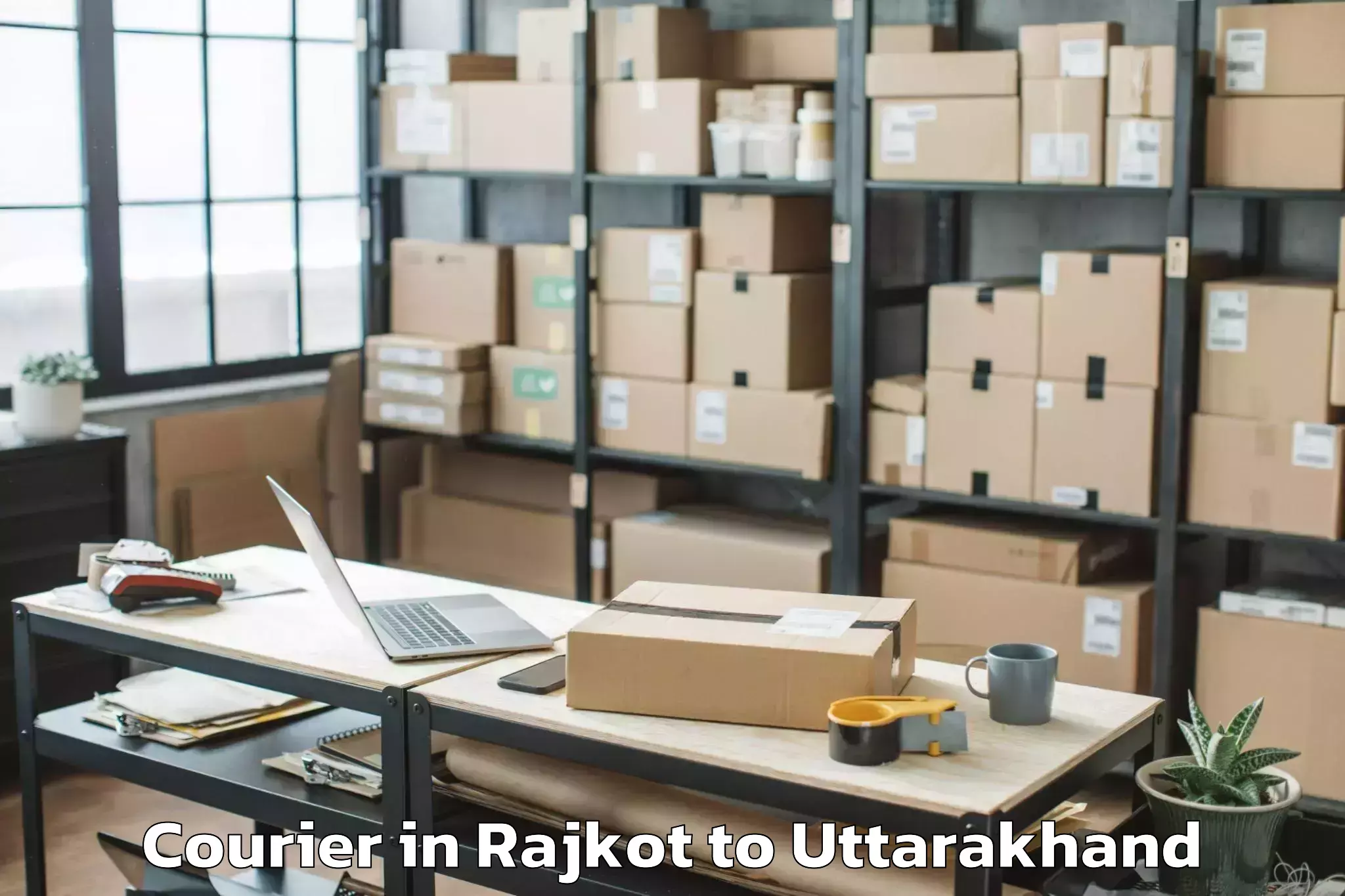 Trusted Rajkot to Tanakpur Courier